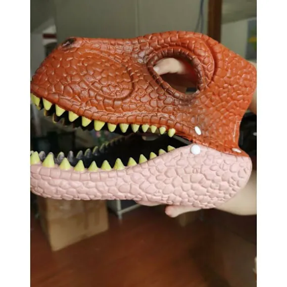 Dinosaurmaske med åbnende kæbe, øjen- og næseåbninger og sikker
